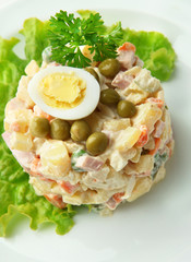 Russian traditional salad Olivier, close-up