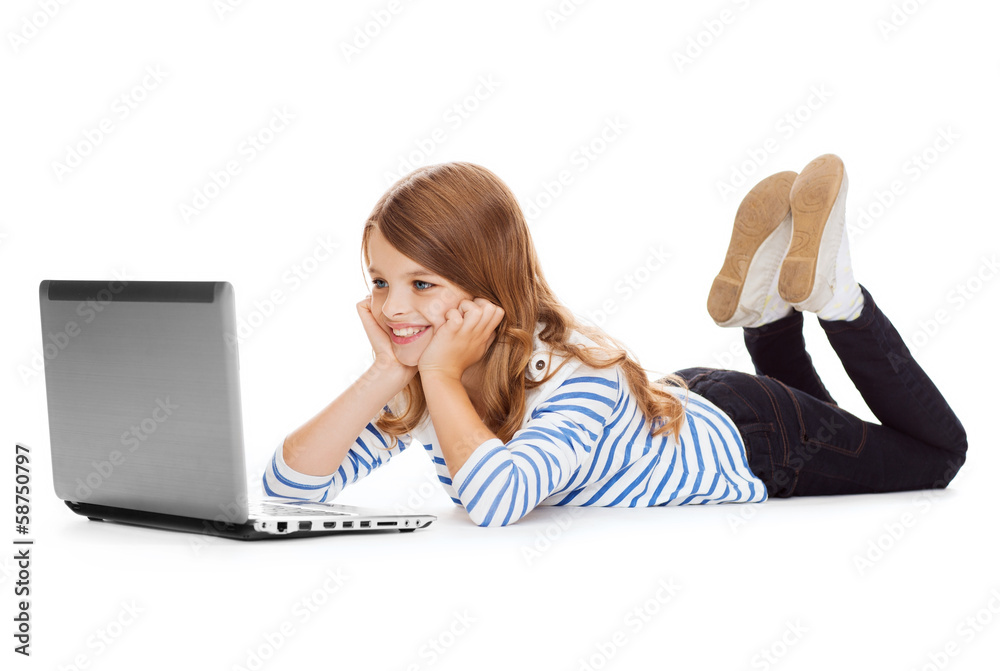 Fototapete smiling student girl with laptop computer lying