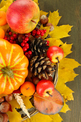 Naklejka na ściany i meble Beautiful autumn composition, on wooden background