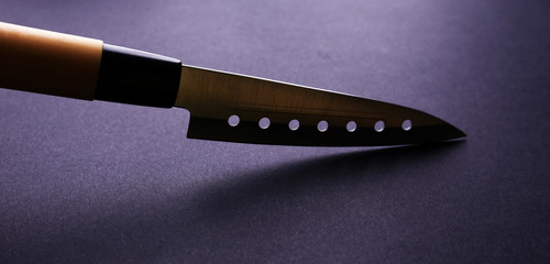 Kitchen knife isolated on black