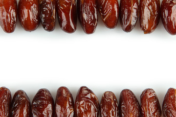 Dried dates isolated on white