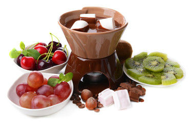 Chocolate fondue with marshmallow  and fruits, isolated on