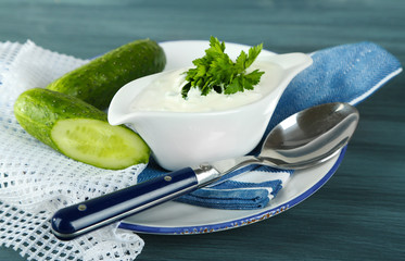 Cucumber yogurt in sauceboat,