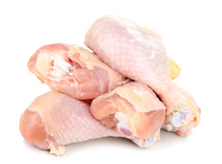 Raw chicken legs isolated on white