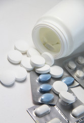 Mix of pills and tablets on the table