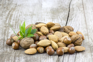 nuts on old wooden background