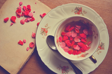 Old book with green tea