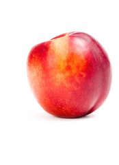 Close up of a nectarine, isolated on white