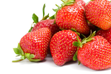 Close up of heap of strawberry, isolated on white