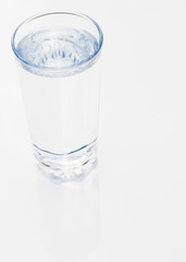 Glass of water on a white background