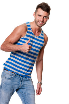 handsome smiling man gives thumbs up