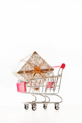 Christmas presents in shopping trolley