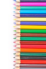 Colored pencils isolated on white background