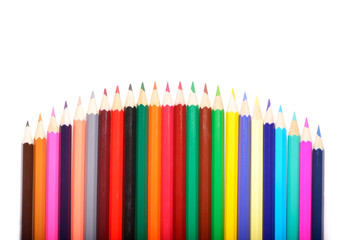 Colored pencils isolated on white background