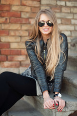 Long haired sexy woman in sunglasses - outdoor portrait