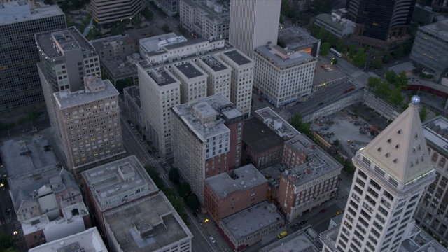 Aerial dusk view of downtown  office blocks Smith Tower Seattle, USA 