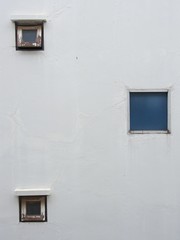 Small windows on the old wall