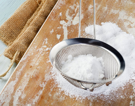 Powdered Sugar In A Metal Sieve