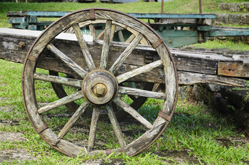 Fototapeta na wymiar Vintage Wooden Wagon Wheel