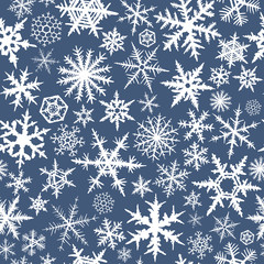 Naklejka na ściany i meble Seamless pattern from snowflakes on dark blue background.
