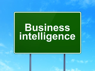 Finance concept: Business Intelligence on road sign background