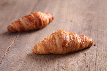 croissant on wood background