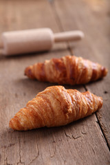 croissant on wood background