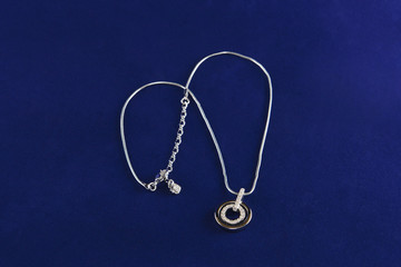 Fototapeta na wymiar necklace isolated on a blue background
