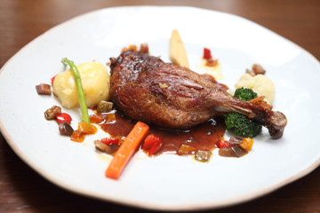 Duck confit , Roasted duck with blueberry sauce