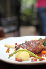 Duck confit , Roasted duck with blueberry sauce