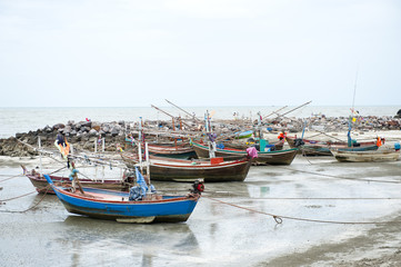 Fototapeta na wymiar Wooden fishing boat on the beach.