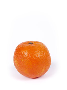 Small mandarin isolated over a white background