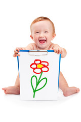 Smiling baby holding a clipboard