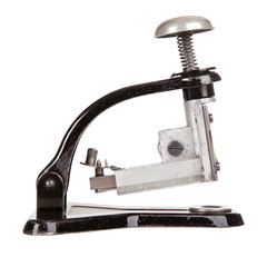 Vintage stapler isolated on white