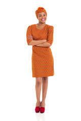 young african girl with arms crossed