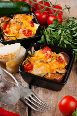 Two dishes of vegetable casserole