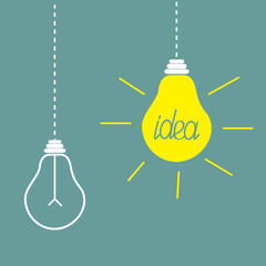 Two hanging yellow light bulbs. Idea concept.