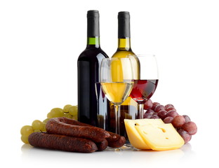 Wine, grapes, cheese an sausage isolated on white