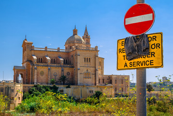 Basilica of Ta Pinu behind a stop sign in Gozo