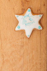 Christmas gingerbread cake star with icing and decoration