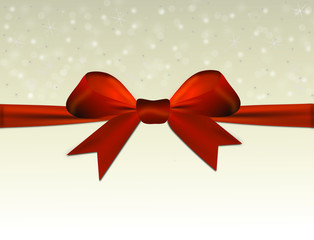 Shiny beige background with red bow