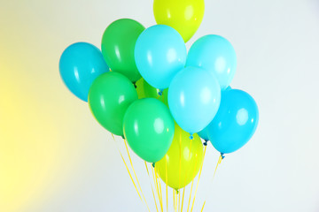 Colorful balloons on color background