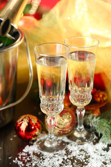 Composition with Christmas decorations and two champagne