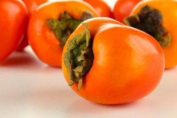 Ripe persimmons close up