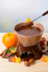 Chocolate fondue with fruits,