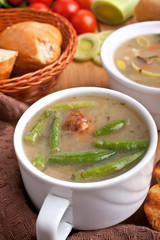 vegetable soup with meatballs, green beans and bread