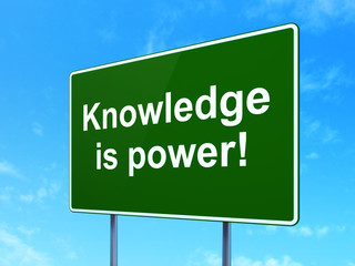 Education concept: Knowledge Is power! on road sign background
