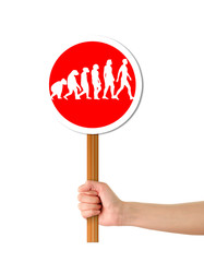 Hand holding red alert sign