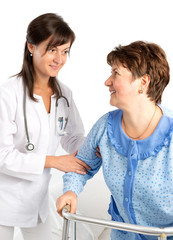 Doctor helps a senior patient