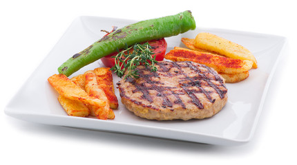 White meat plate with french fries isolated on white